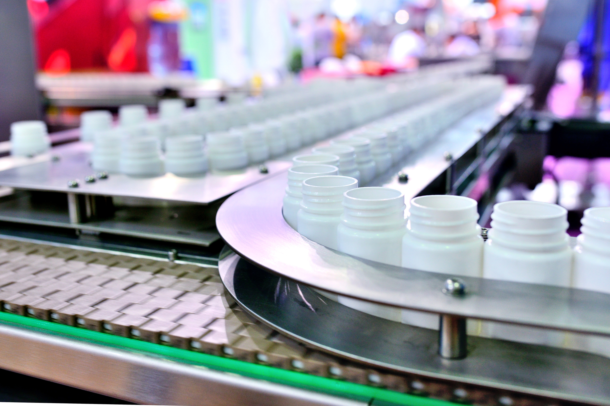 Close-up of bottling plant production line.